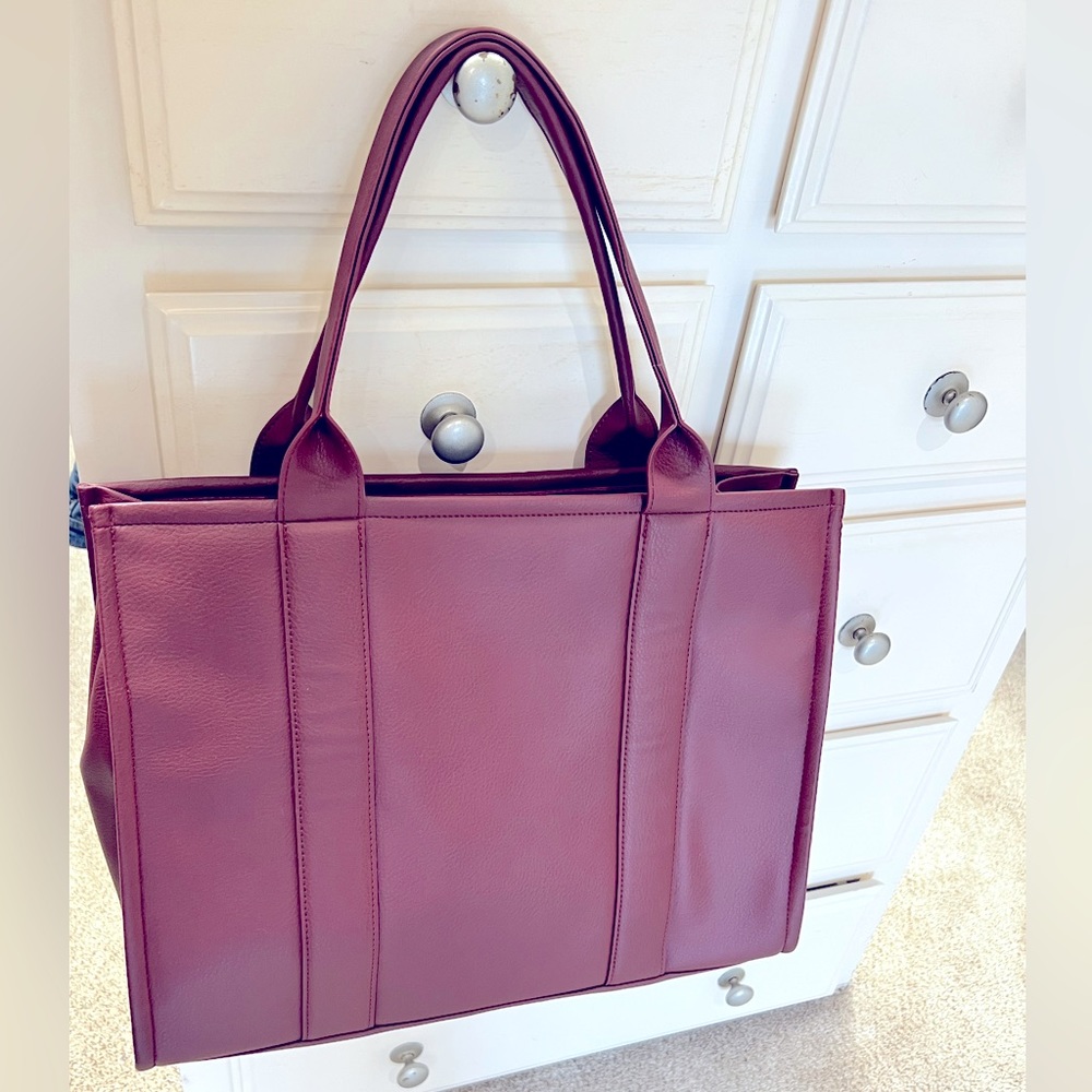 Just Fab brand new laptop bag. Burgundy bag. Perfect for traveling and work.